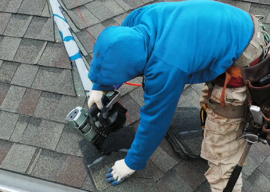 a man working on a roof