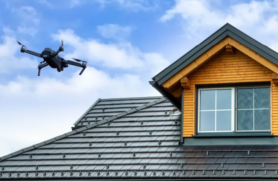 a drone flying over a house