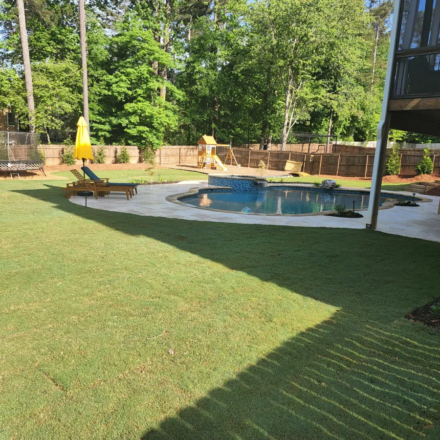 a swimming pool in a backyard