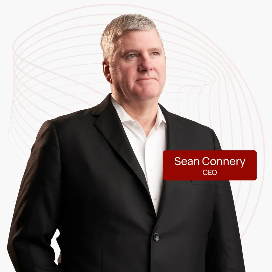Professional middle-aged man in black suit with white shirt standing against a white background with abstract lines