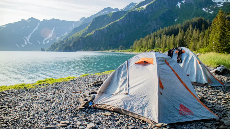 a tent on a rocky shore