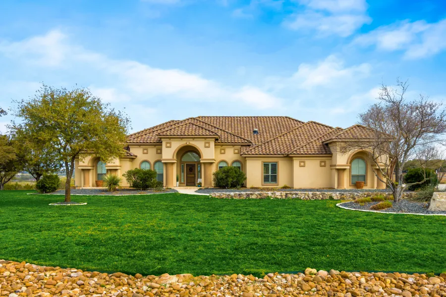 a large house with a lawn