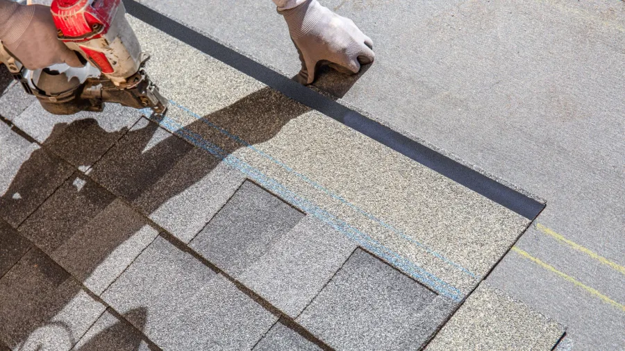 a person's feet on a tile floor