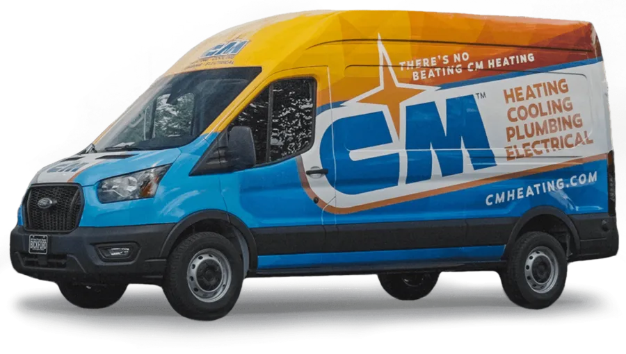 CM Heating service van with bright blue and orange branding advertising heating, cooling, plumbing, and electrical services.