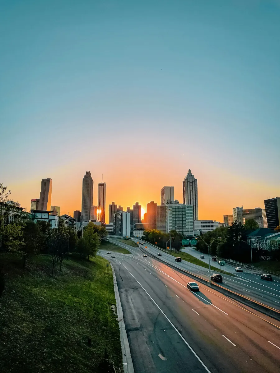 Atlanta city skyline with a freeway and cars