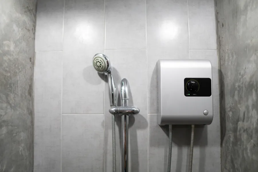 a shower head and a toilet