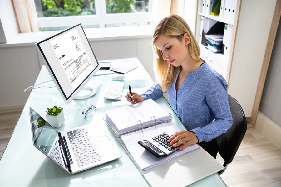 a woman working on her computer