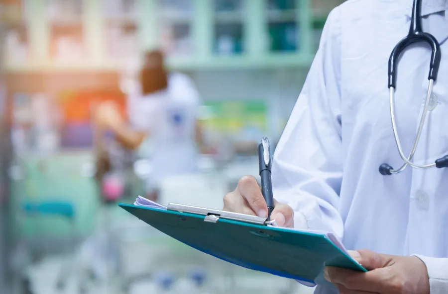a doctor using a tablet