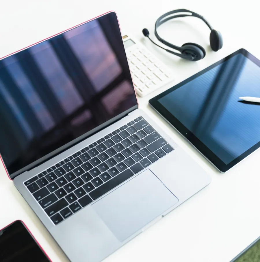 a laptop and a cup of coffee