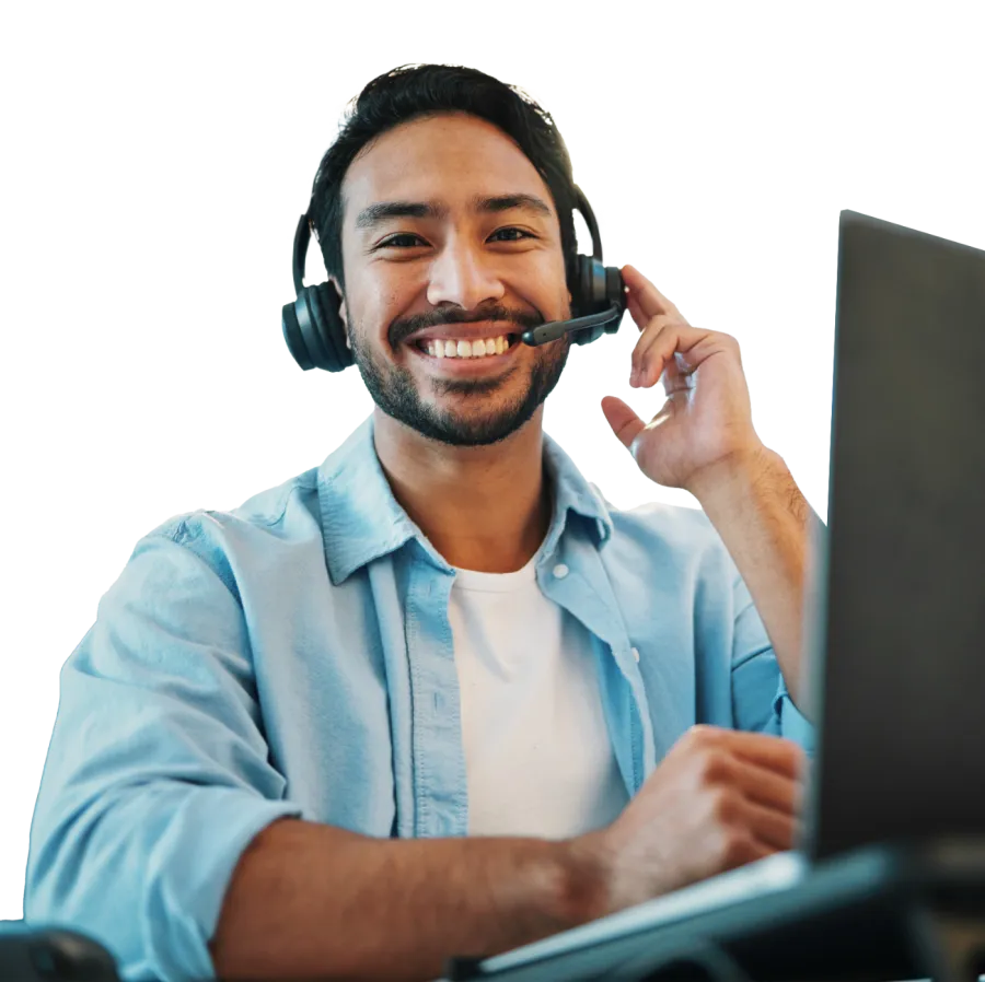 a man wearing headphones and holding a pen to his ear