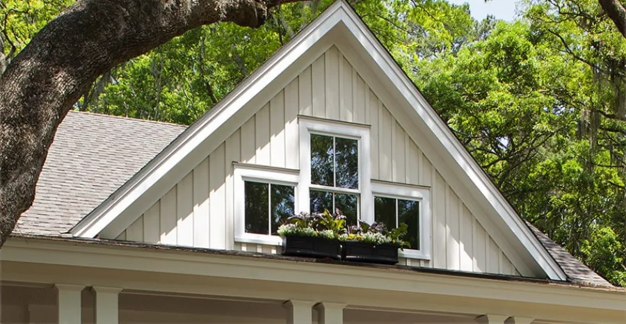 a house with a tree in the front