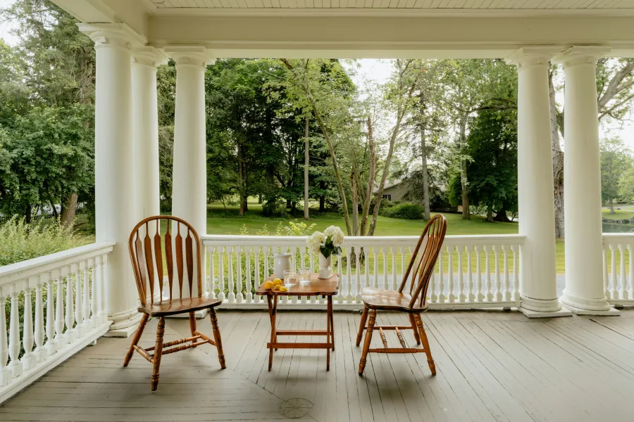 a table and chairs on a deck