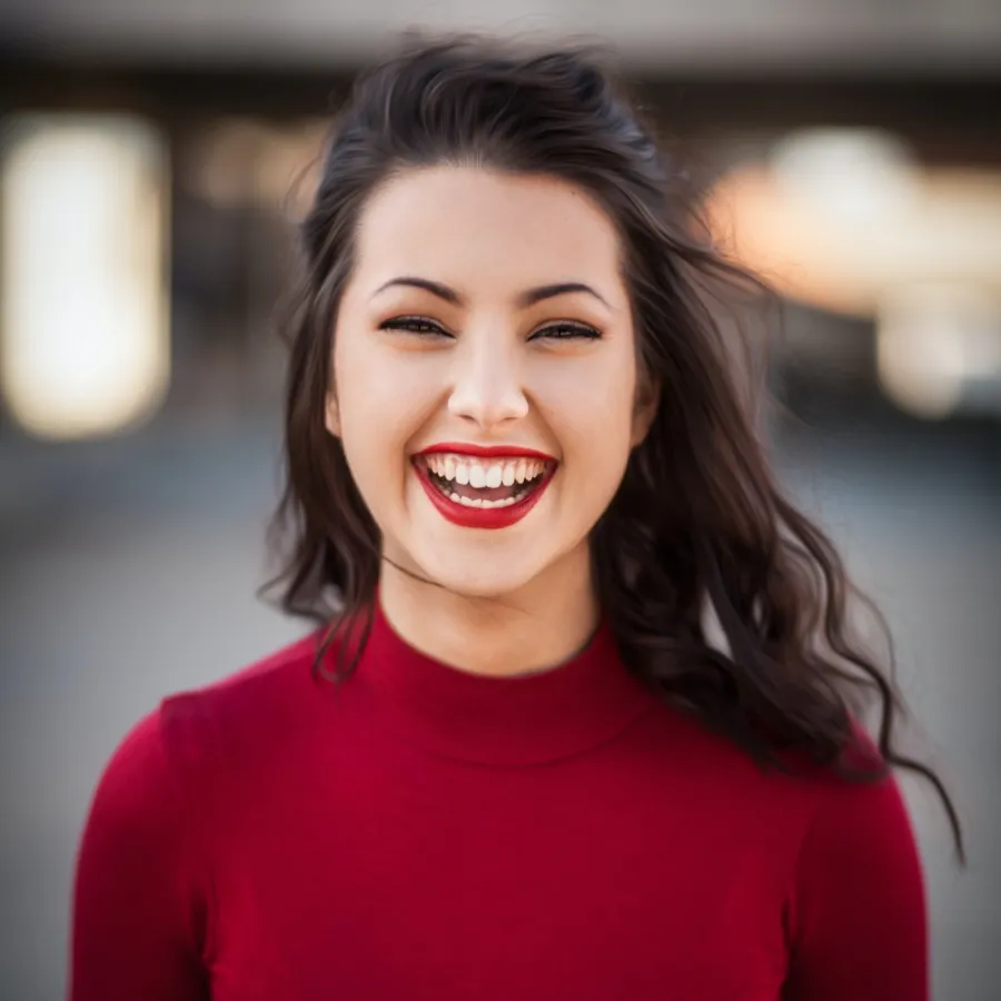 a woman smiling at the camera