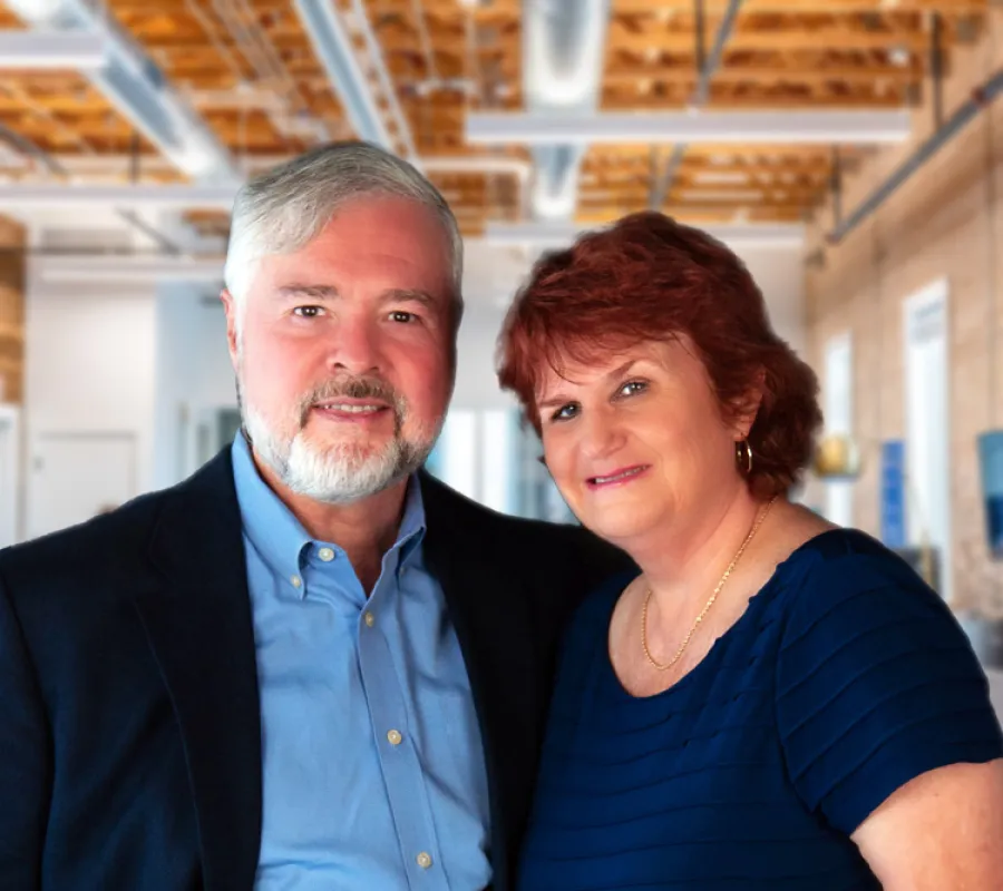 a man and woman posing for a photo