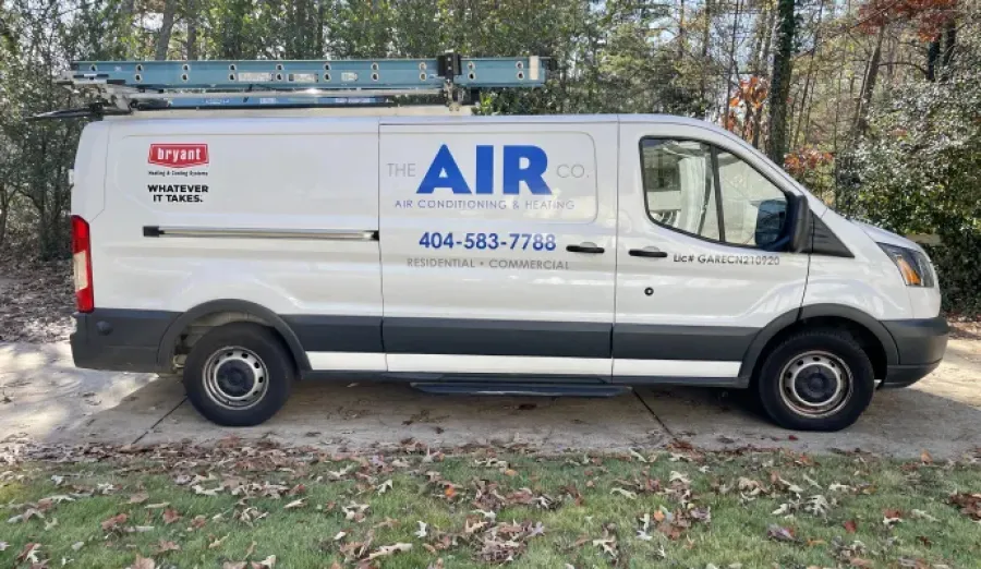 a white van with blue lettering
