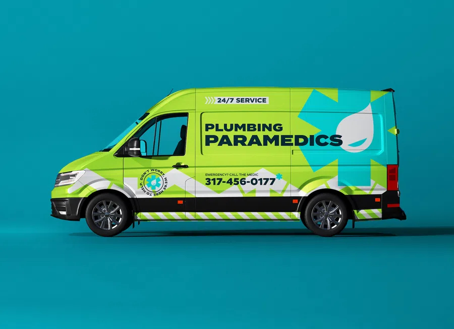 Green Plumbing Paramedics service van with contact number 317-456-0177 on blue background