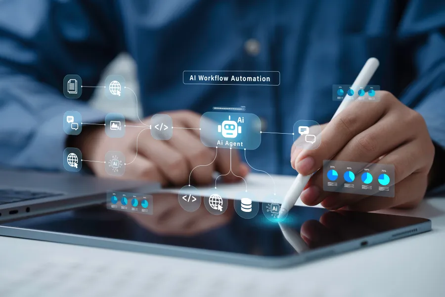 Person using stylus on tablet with AI workflow automation and data analytics digital interface overlays