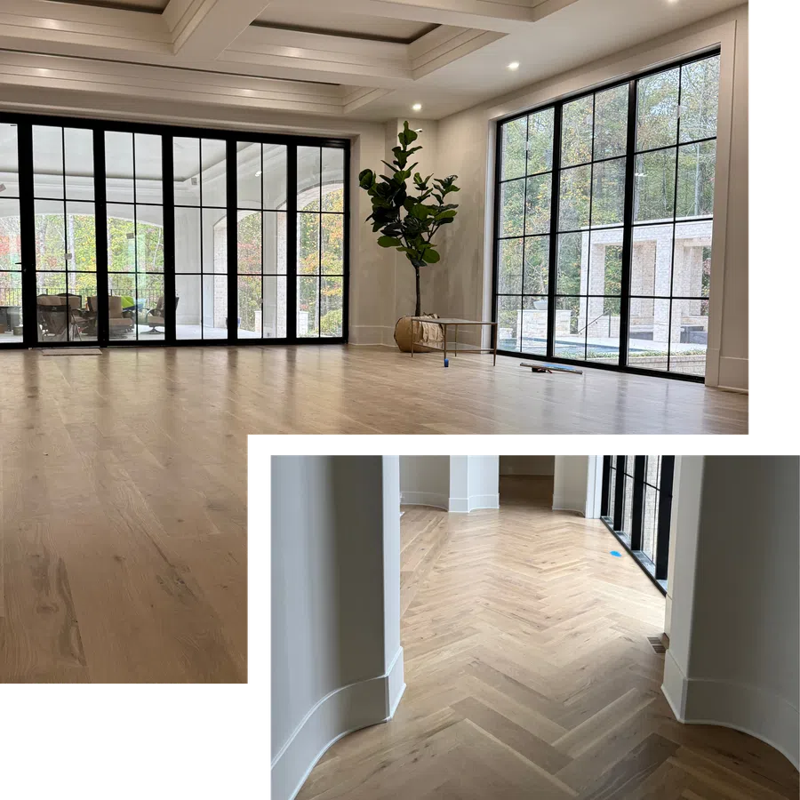 Modern empty room with light wood flooring, large black-framed windows, and a potted plant near the corner
