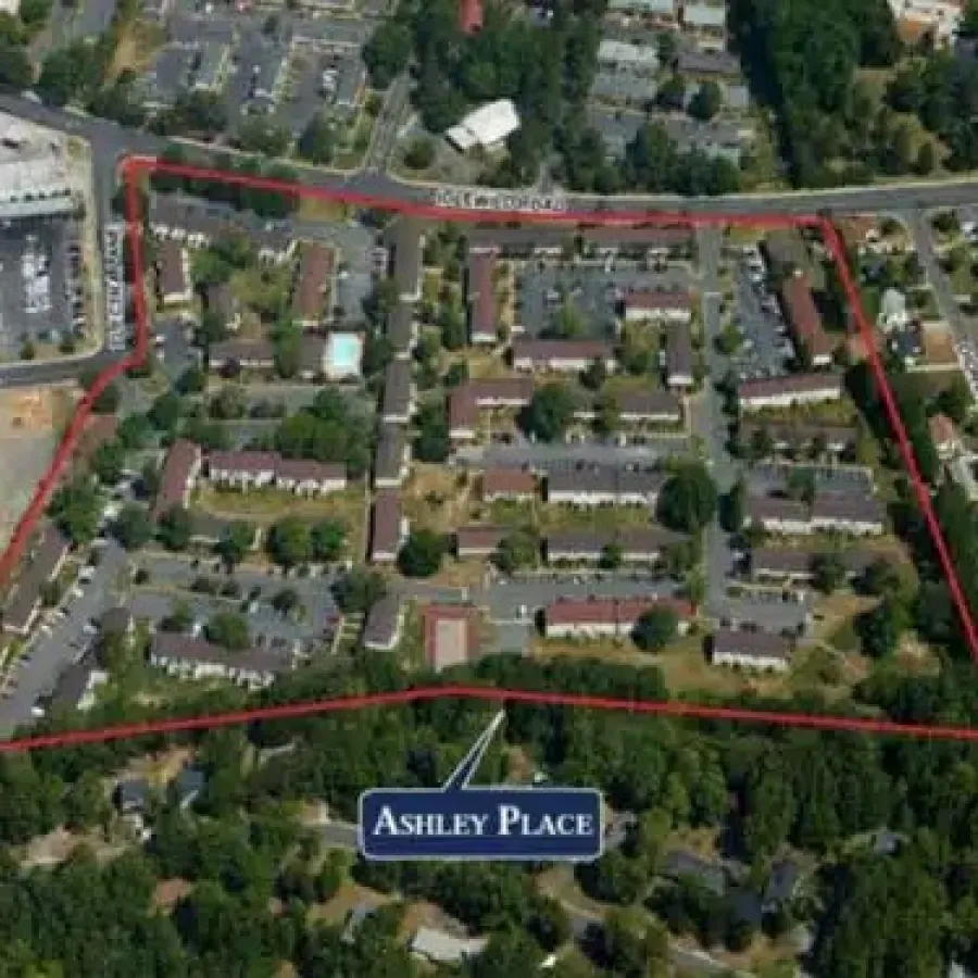 Aerial view of Ashley Place residential complex outlined in red amidst surrounding neighborhood and greenery.
