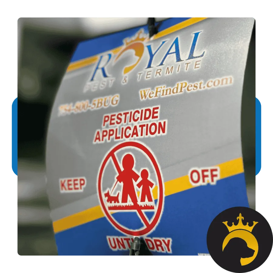 Royal Pest & Termite sign warning pesticide application, advising to keep off and stay untidy for safety.