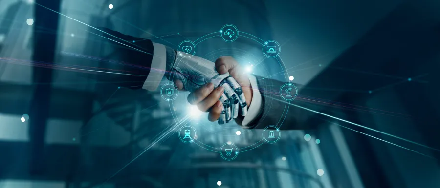 Human hand shaking robotic hand surrounded by digital icons representing technology and connectivity.